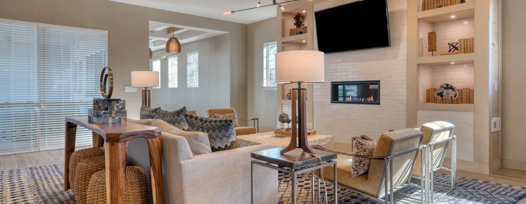 a living room with a tv and a table
